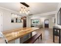 Bright dining area with large granite table and bench seating at 127 E Garfield St, Tempe, AZ 85288
