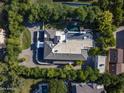 Aerial view showing the house, pool, and surrounding landscape at 6644 E Exeter Blvd, Scottsdale, AZ 85251