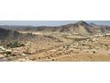 Aerial view of land with desert landscape and mountains at 8008 W Jadan St, Coolidge, AZ 85128