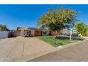 Ranch style home with a well manicured lawn at 7830 N 17Th Ave, Phoenix, AZ 85021