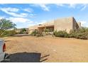 Large stucco home with double garage and covered porch at 44811 N 12Th St, New River, AZ 85087