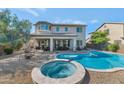 Inviting backyard oasis with a large pool and spa at 3730 E Cat Balue Dr, Phoenix, AZ 85050