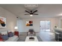 Virtually staged living room featuring modern furniture and patio access at 2625 E 10Th St, Tempe, AZ 85288