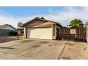 Ranch-style home with a single-car garage and basketball hoop at 6742 W Colter St, Glendale, AZ 85303