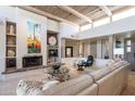 Spacious living room with a fireplace and high ceilings at 11166 E Prospect Point Dr, Scottsdale, AZ 85262