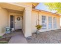 Welcoming front entry with decorative door and landscaping at 16410 S 46Th Pl, Phoenix, AZ 85048