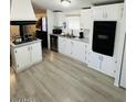 Bright kitchen featuring modern appliances and ample cabinet space at 9501 E Broadway Rd # 101, Mesa, AZ 85208