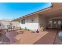 Covered patio with seating area at 12518 W Parkwood Dr, Sun City West, AZ 85375