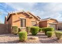 Charming single-story home with well-manicured landscaping at 2247 E Indian Wells Dr, Gilbert, AZ 85298
