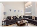 Spacious living room featuring a sectional sofa and ample natural light at 1515 E South Fork Dr, Phoenix, AZ 85048