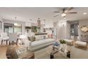Open concept living room and kitchen with island at 2114 S El Marino --, Mesa, AZ 85202