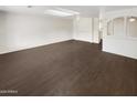 Spacious living room with dark hardwood floors at 4321 N 50Th Dr, Phoenix, AZ 85031