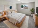 Bright bedroom with wood bed frame and neutral decor at 4321 N 50Th Dr, Phoenix, AZ 85031