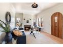 Living room with hardwood floors, fireplace, and stylish furnishings at 930 W Lynwood St, Phoenix, AZ 85007