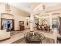 Elegant dining room with ornate furniture and views of the living room at 4958 E Skinner Dr, Cave Creek, AZ 85331