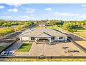 Luxury home showcasing a large backyard, patio, and landscaping at 17617 W Rose Ln, Waddell, AZ 85355