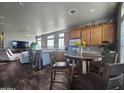 Modern kitchen with stainless steel appliances and an island at 650 N Hawes Rd # 3820, Mesa, AZ 85207