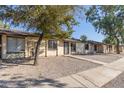 Front view of a triplex style building at 3646 N 69Th Ave # 60, Phoenix, AZ 85033