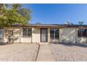 Front view of a triplex style building at 3646 N 69Th Ave # 60, Phoenix, AZ 85033