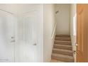 Interior condo view of a carpeted staircase at 2402 E 5Th St # 1429, Tempe, AZ 85288