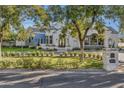 Luxury home with a grand entrance and manicured landscaping at 20445 E Sunset Ct, Queen Creek, AZ 85142