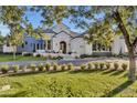Luxury home with a grand entrance and manicured landscaping at 20445 E Sunset Ct, Queen Creek, AZ 85142