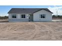 Craftsman style home with a neutral exterior at 25848 W Oberlin Way, Wittmann, AZ 85361