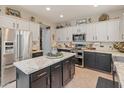 Modern kitchen with granite countertops and stainless steel appliances at 3331 W Hemingway Ln, Anthem, AZ 85086