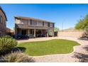 Artificial turf backyard with patio and grill at 36021 N 32Nd Dr, Phoenix, AZ 85086