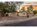Two houses side-by-side with attached garages and desert landscaping at 1384 E Morelos St, Chandler, AZ 85225