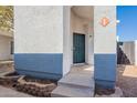 Front entrance with blue and white exterior, steps, and landscaping at 280 S Elizabeth Way # 1, Chandler, AZ 85225