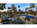 View of the community pool and surrounding grounds at 5136 N 31St Pl # 648, Phoenix, AZ 85016