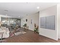 Lobby with seating area, wood floors, and mailboxes at 425 S Parkcrest -- # 336, Mesa, AZ 85206