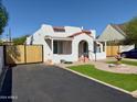 Renovated Spanish-style home with new gates and landscaping at 1922 E Yale St, Phoenix, AZ 85006