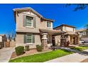 Beautiful two-story home with stone accents and landscaping at 2230 E Fraktur Rd, Phoenix, AZ 85040