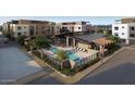 Aerial view of community pool and building at 19360 N 73Rd St # C, Scottsdale, AZ 85255