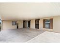 Covered carport offering shade and protection from elements at 9302 E Broadway Rd # 42, Mesa, AZ 85208