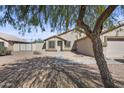 House exterior showcasing walkway, landscaping, and a covered entryway at 1308 W Pleasant Ln, Phoenix, AZ 85041