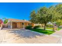 House exterior showcasing driveway and front yard at 5745 N 13Th St, Phoenix, AZ 85014