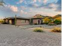 One-story home with desert landscaping and driveway at 2554 N Tambor --, Mesa, AZ 85207