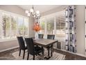 Bright dining room with large windows and plantation shutters at 1785 S Nebraska St, Chandler, AZ 85286