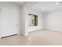 Bright entryway with tile floors, white door and large window at 25952 S 224Th Pl, Queen Creek, AZ 85142