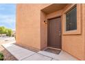 Inviting home exterior with a walkway leading to the front door at 18774 N Ibis Way, Maricopa, AZ 85138