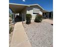 Single-wide manufactured home with carport and walkway at 245 S 56Th St # 209, Mesa, AZ 85206