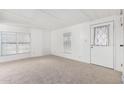 Bright and airy living room with carpeted floors at 205 S Higley Rd # 288, Mesa, AZ 85206