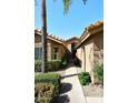 Front entry with walkway, gated access, and landscaping at 15626 N 50Th St, Scottsdale, AZ 85254