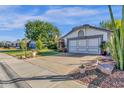 House exterior showcasing curb appeal and driveway at 1513 E Sheffield Ave, Chandler, AZ 85225