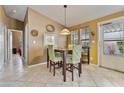 Bright dining area with a table and chairs near the kitchen at 2550 S Ellsworth Rd # 215, Mesa, AZ 85209