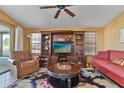 Comfortable living room featuring a media console and seating area at 2550 S Ellsworth Rd # 215, Mesa, AZ 85209