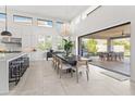 Modern kitchen with large island, stainless steel appliances, and white cabinetry at 13463 N Stone View Trl, Fountain Hills, AZ 85268